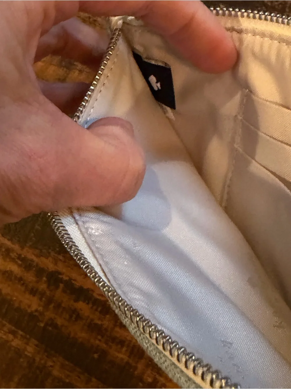 kate spade light denim wristlet with cream strap
